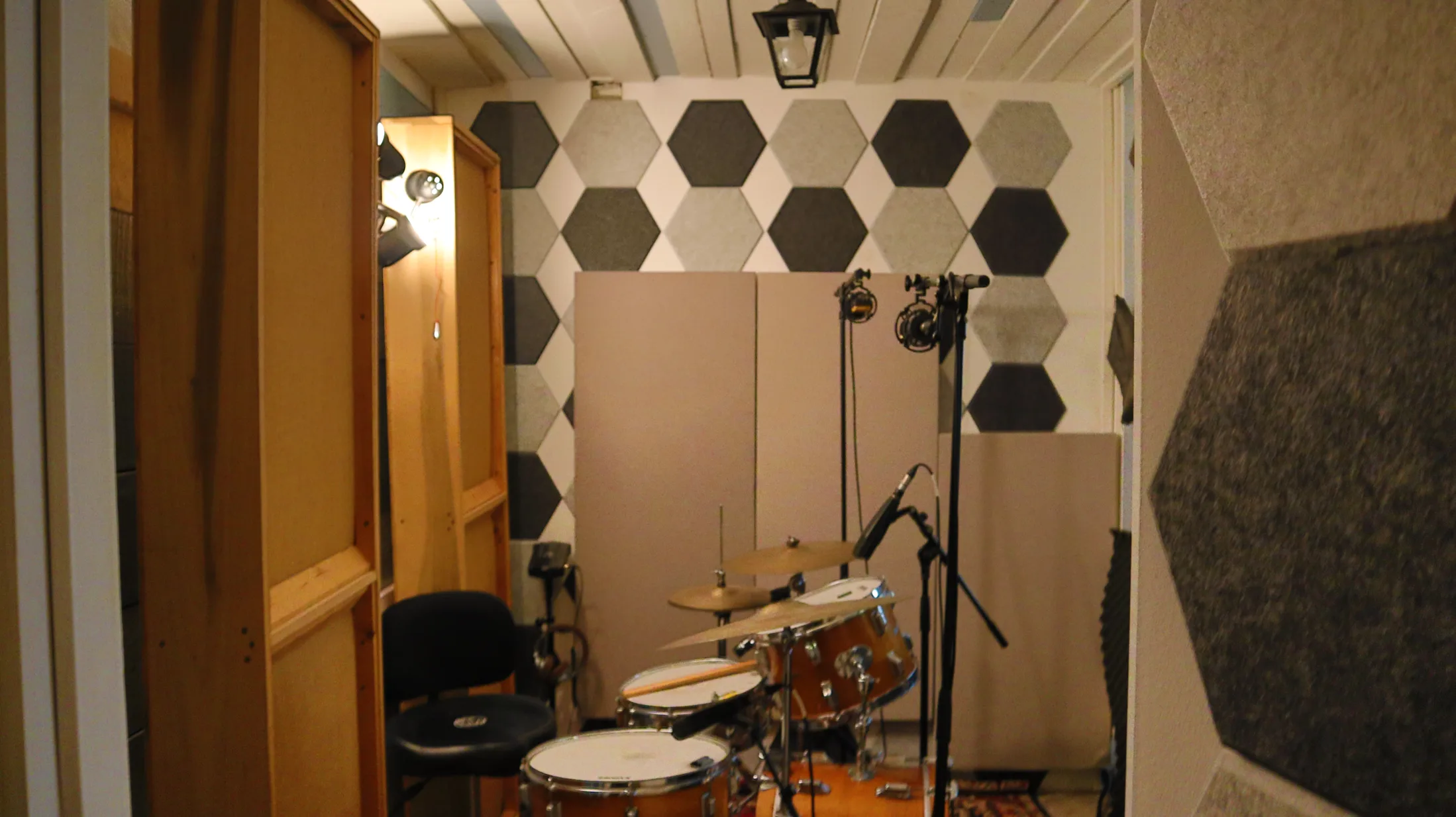 Drum booth with acoustic treatment